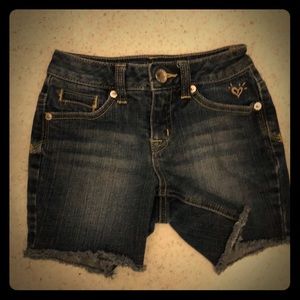 Girls Justice denim cut-off shorts.  Size:8 slim